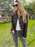 Chaqueta botón dorado formal negra