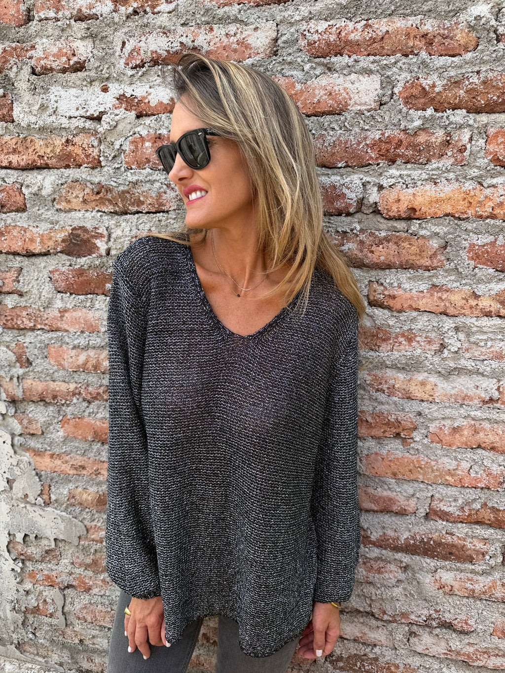 Chaleco lurex manga aglobada negro