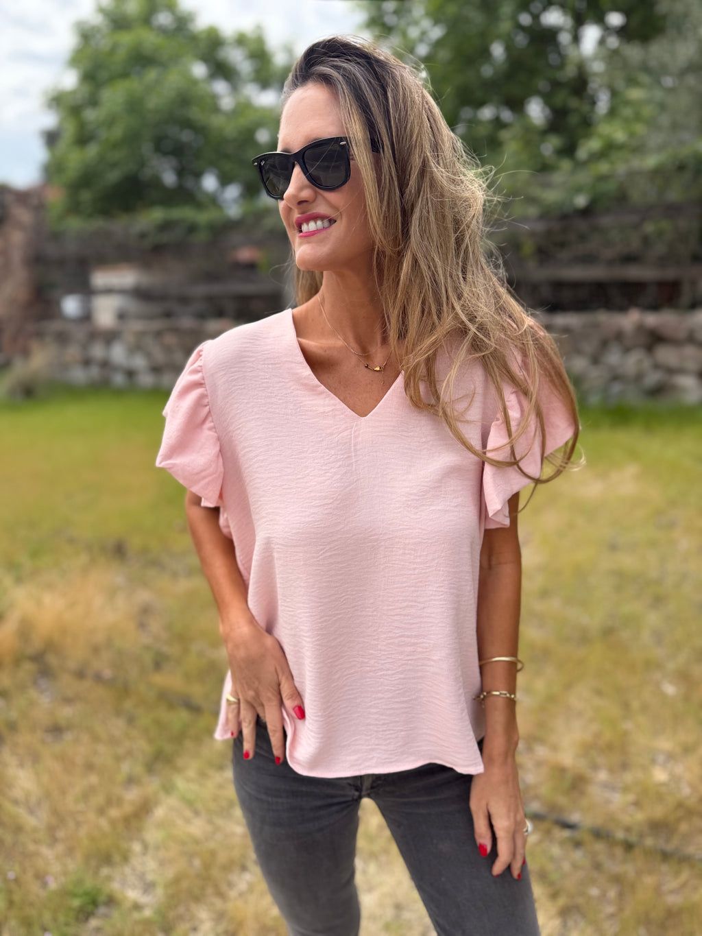 Blusa crep vuelitos mangas rosada