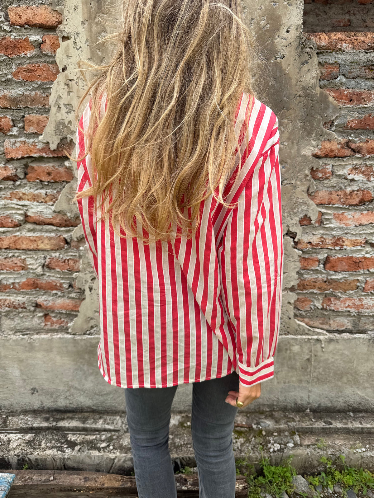 Blusa rayada rosetón roja