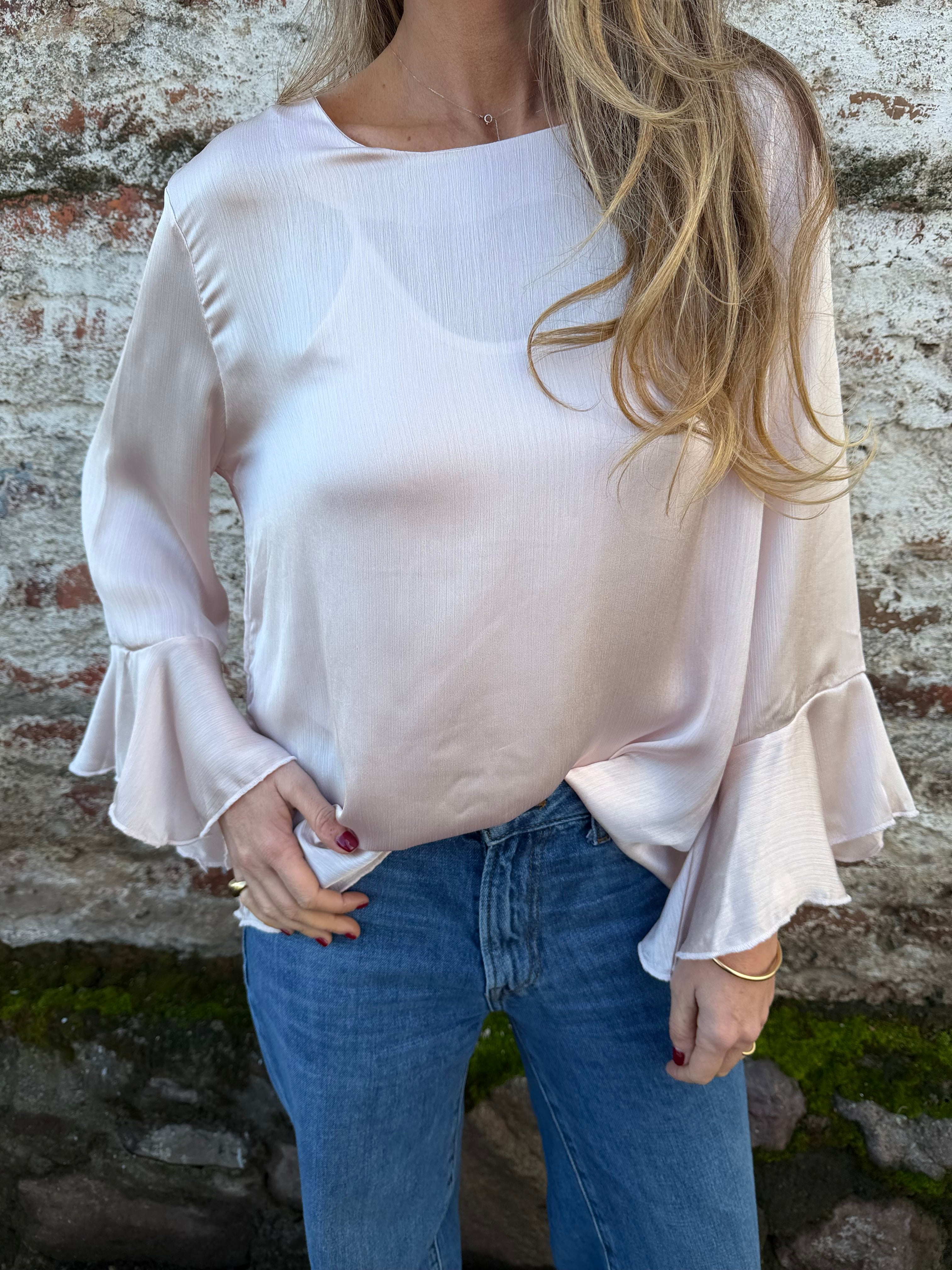 Blusa perlada volados rosado claro