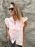 Blusa corazones bordados y vuelitos rosada