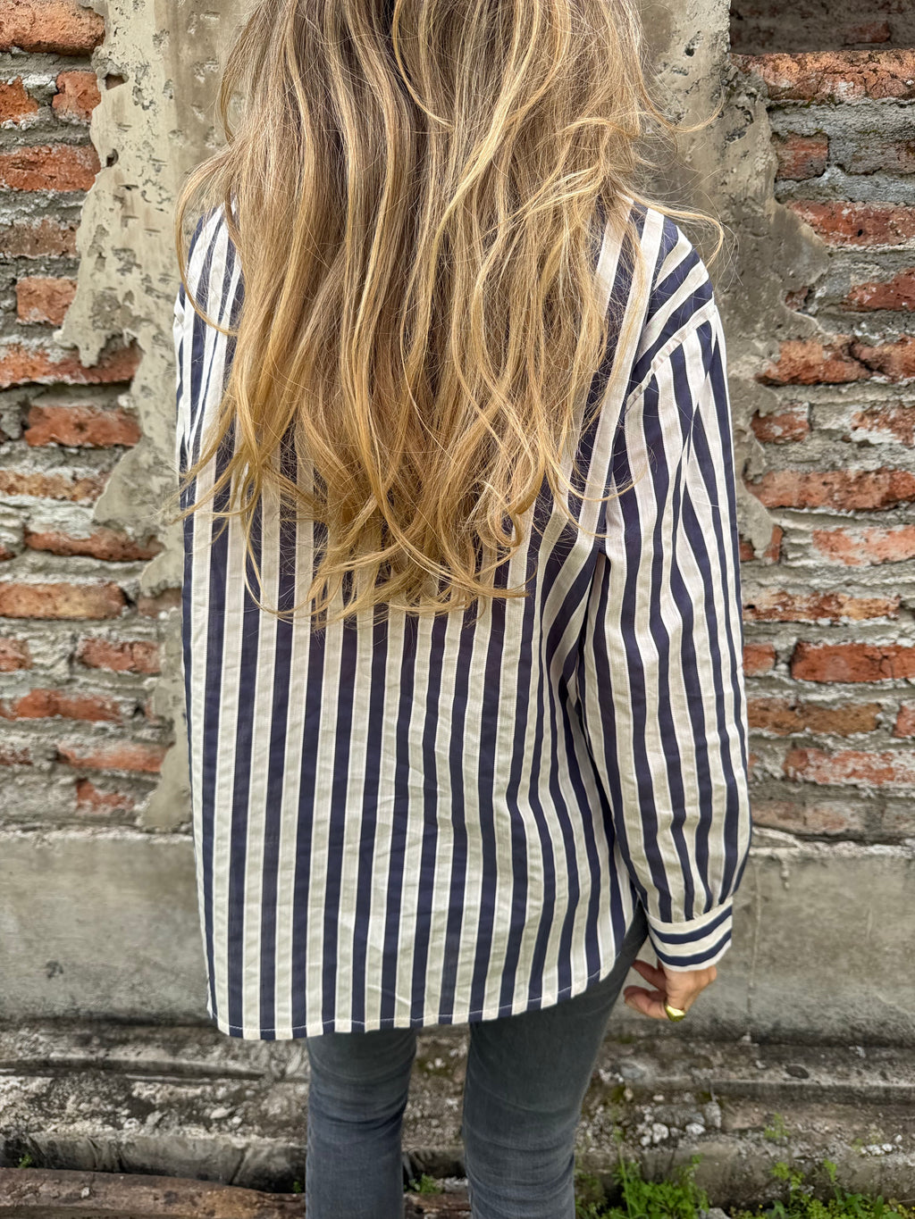 Blusa rayada rosetón azul