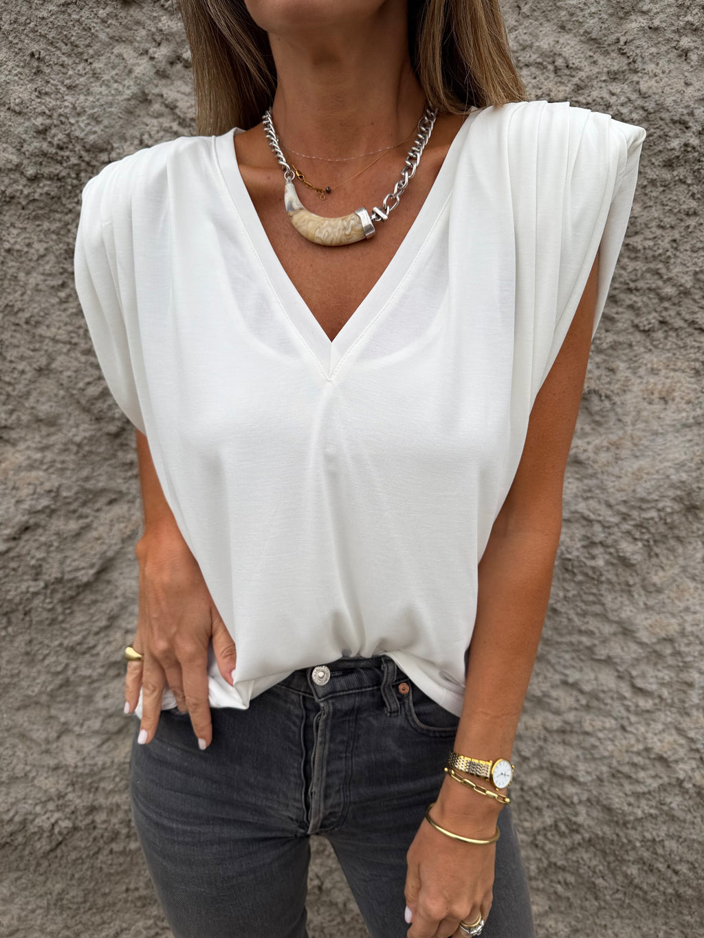 Polera hombreras plisadas blanca