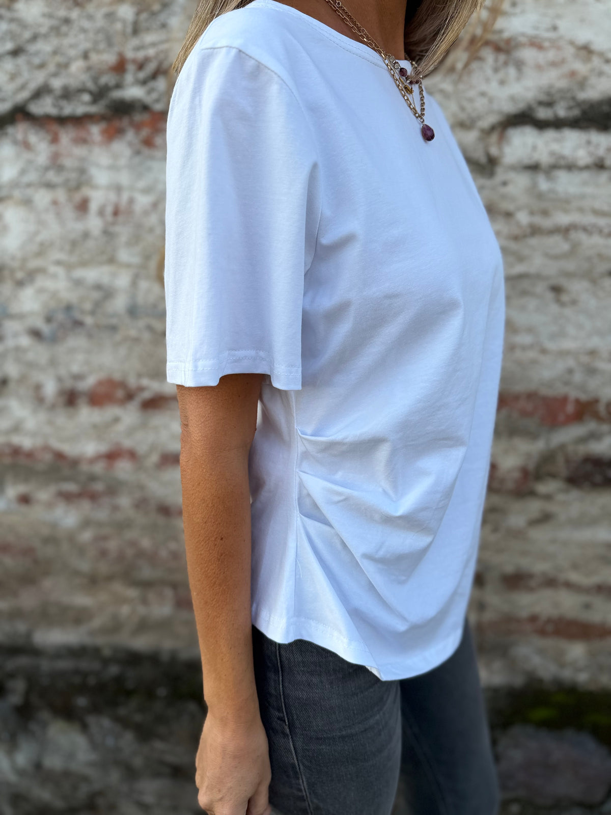 Polera largo irregular blanca