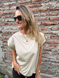 Polera tachitas beige