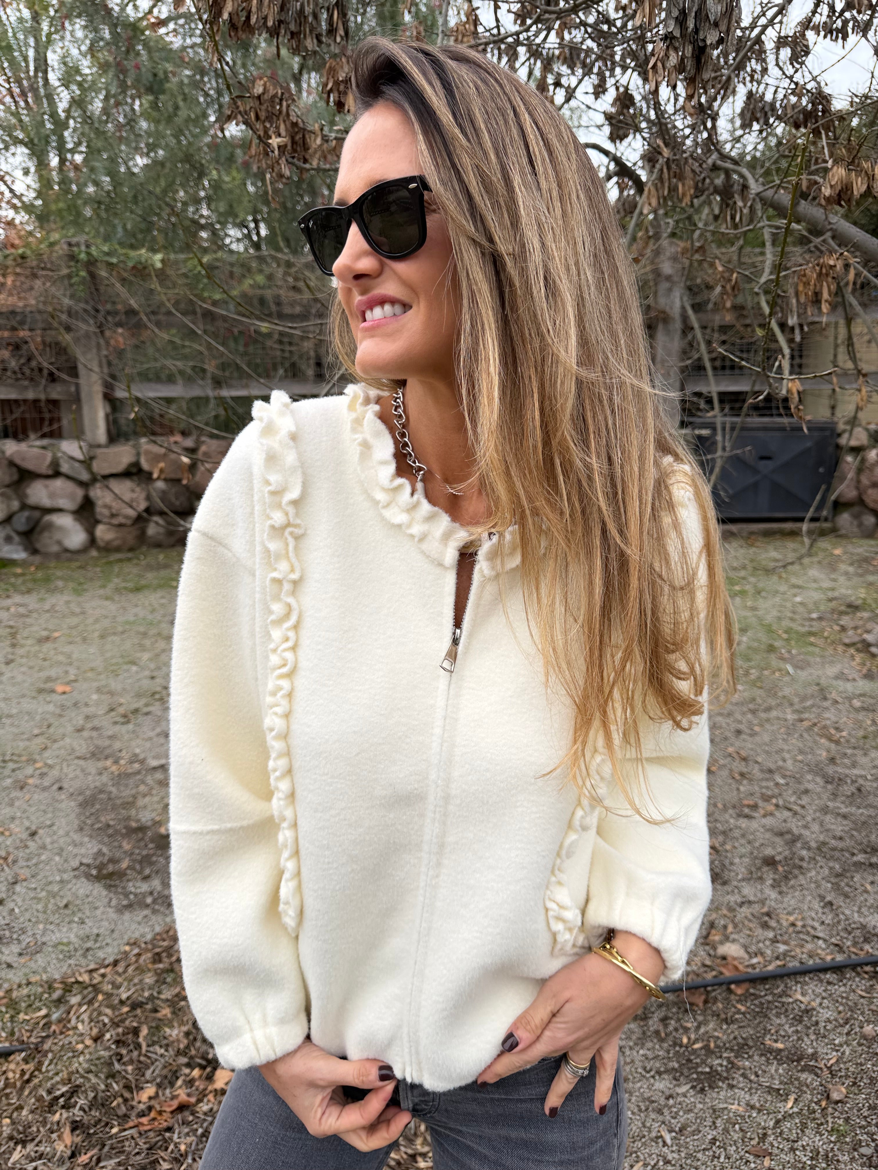 Chaquetita paño vuelitos blanca