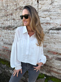 Blusa capas y manga globo blanca