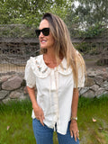 Blusa cuello bobo y flores mantequilla