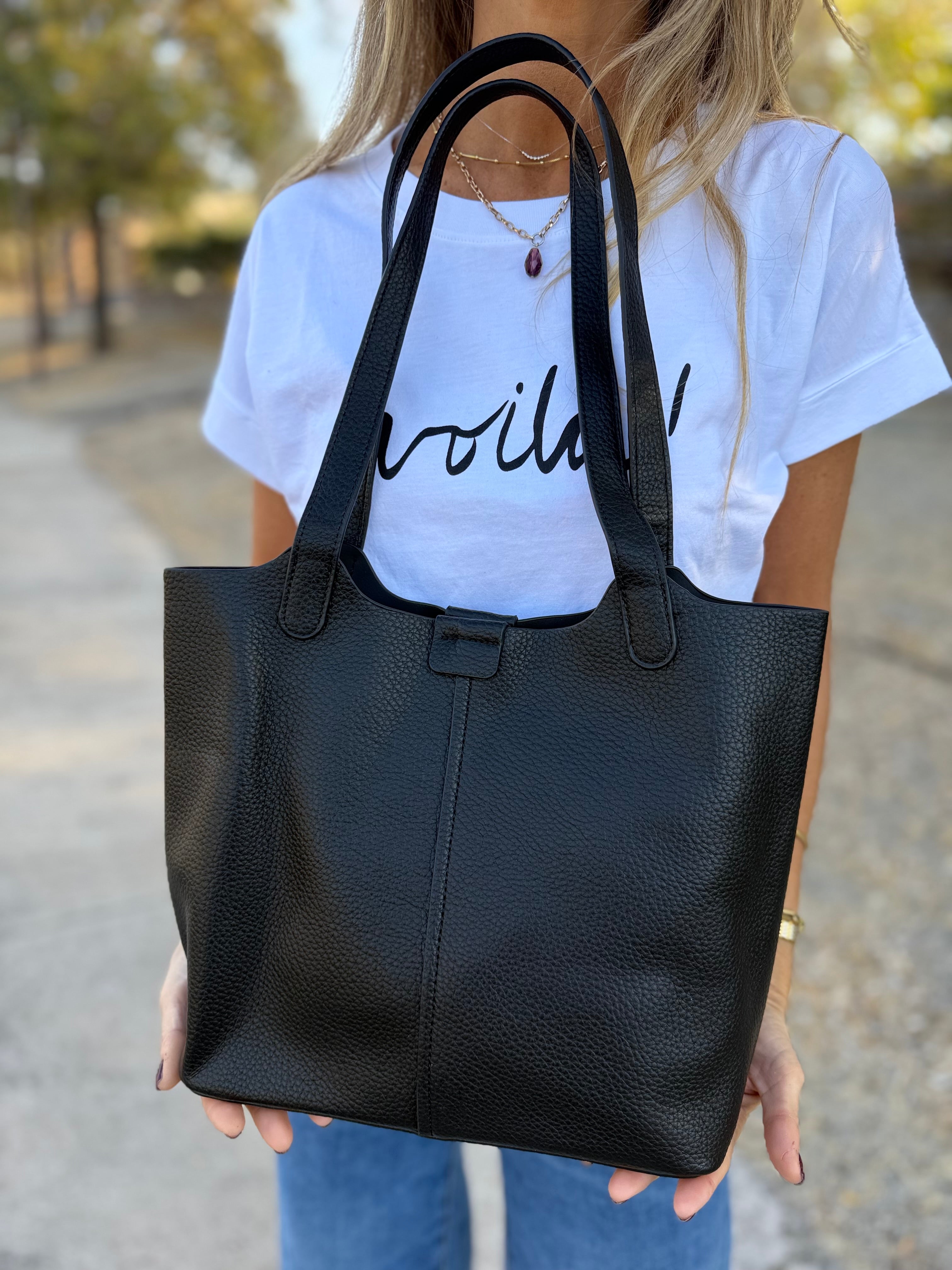 Cartera de hombro y mano en efecto cuero graneado negro