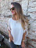 Blusa crep vuelitos mangas crudo