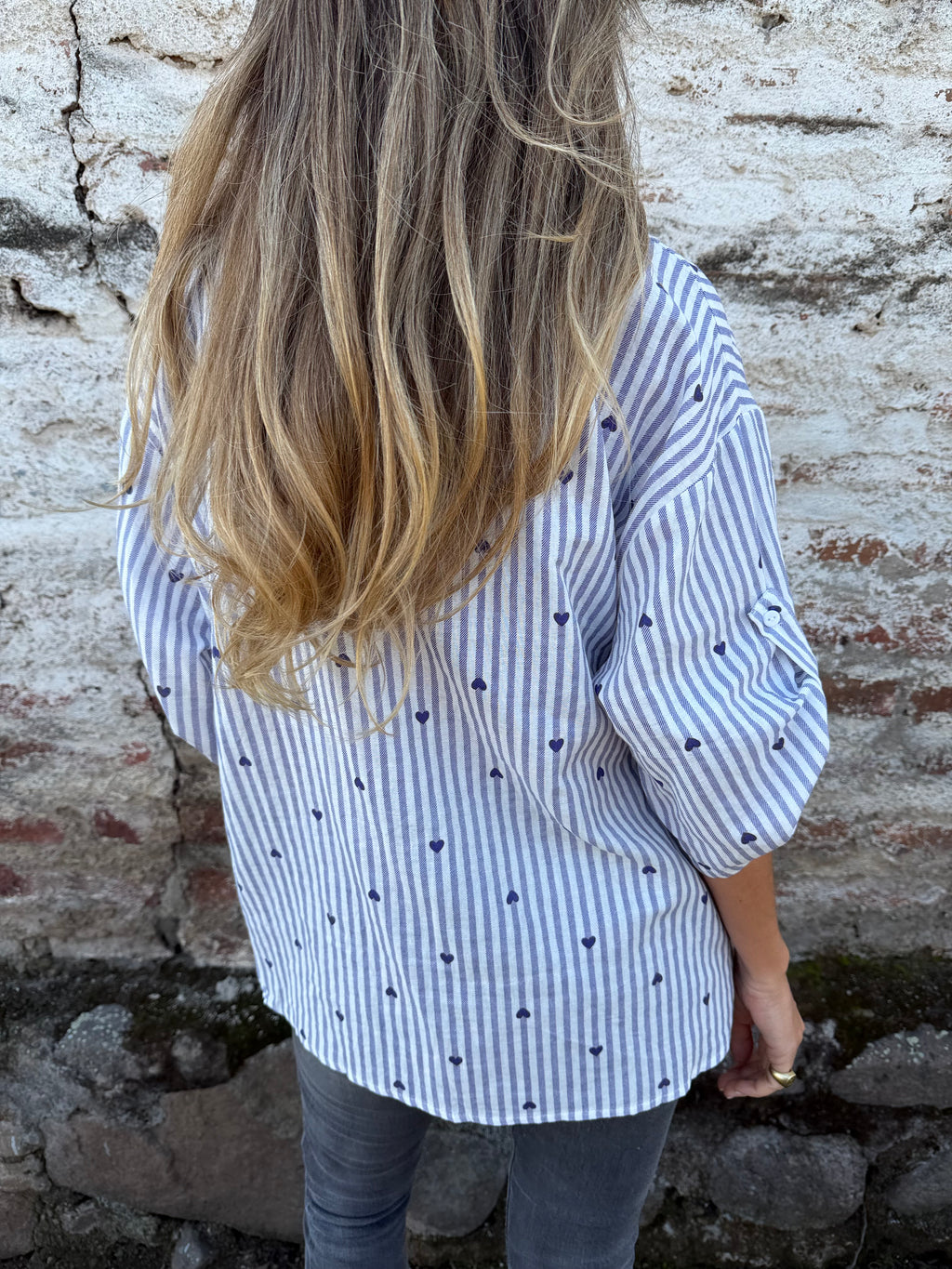 Blusa líneas y corazones azul