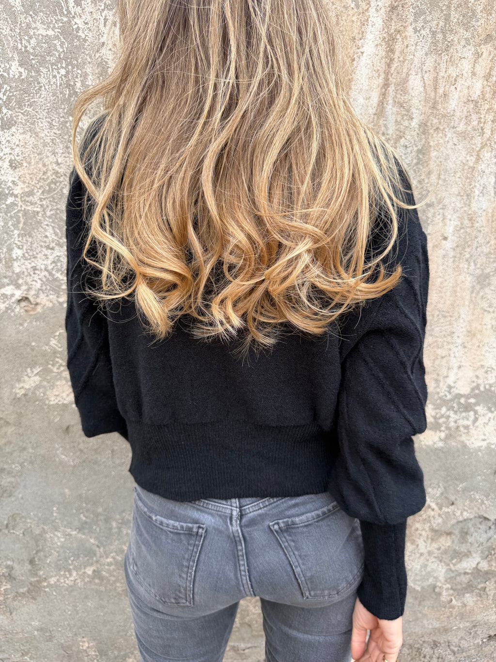 Chaleco mini pompón negro