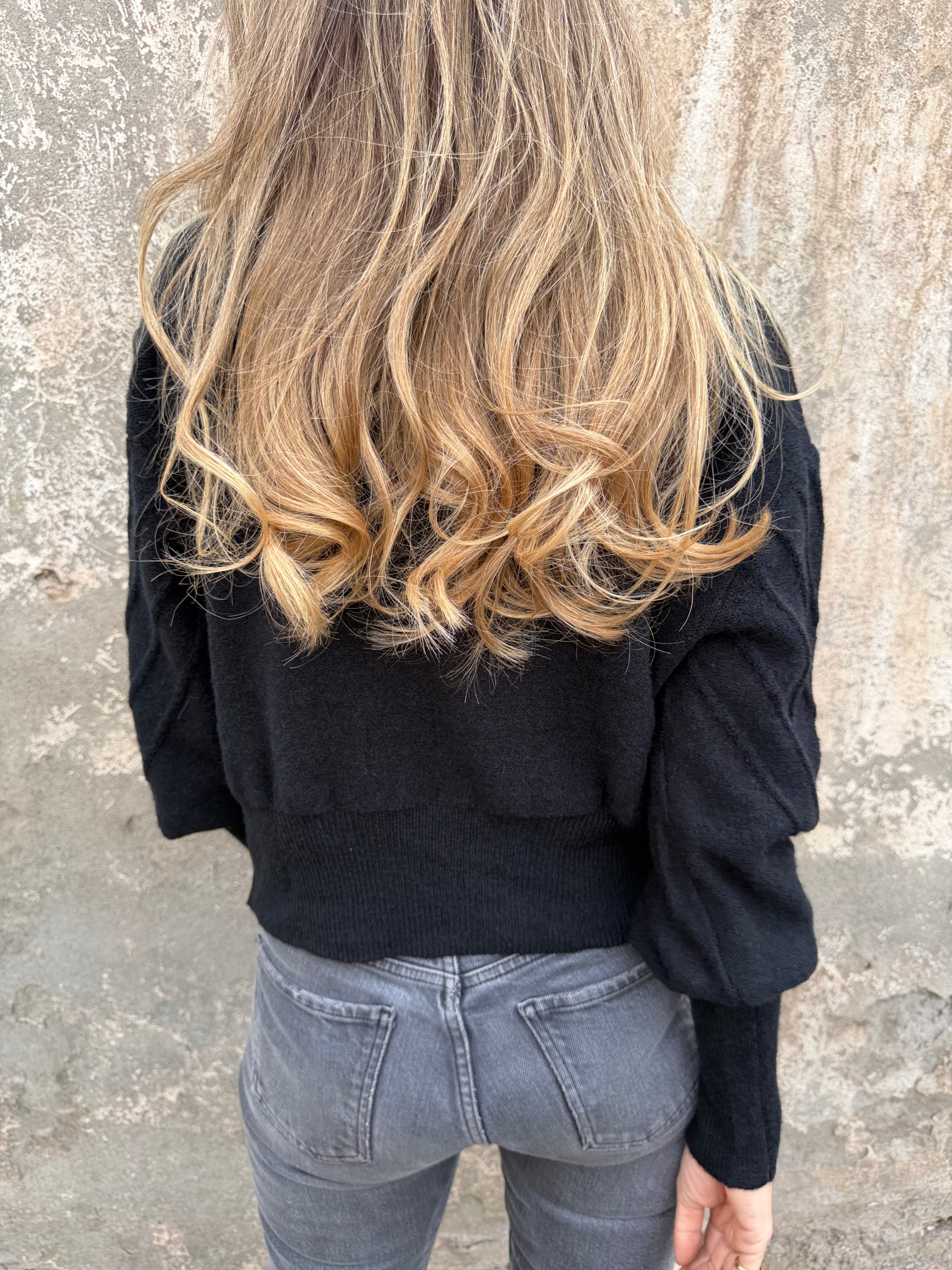 Chaleco mini pompón negro