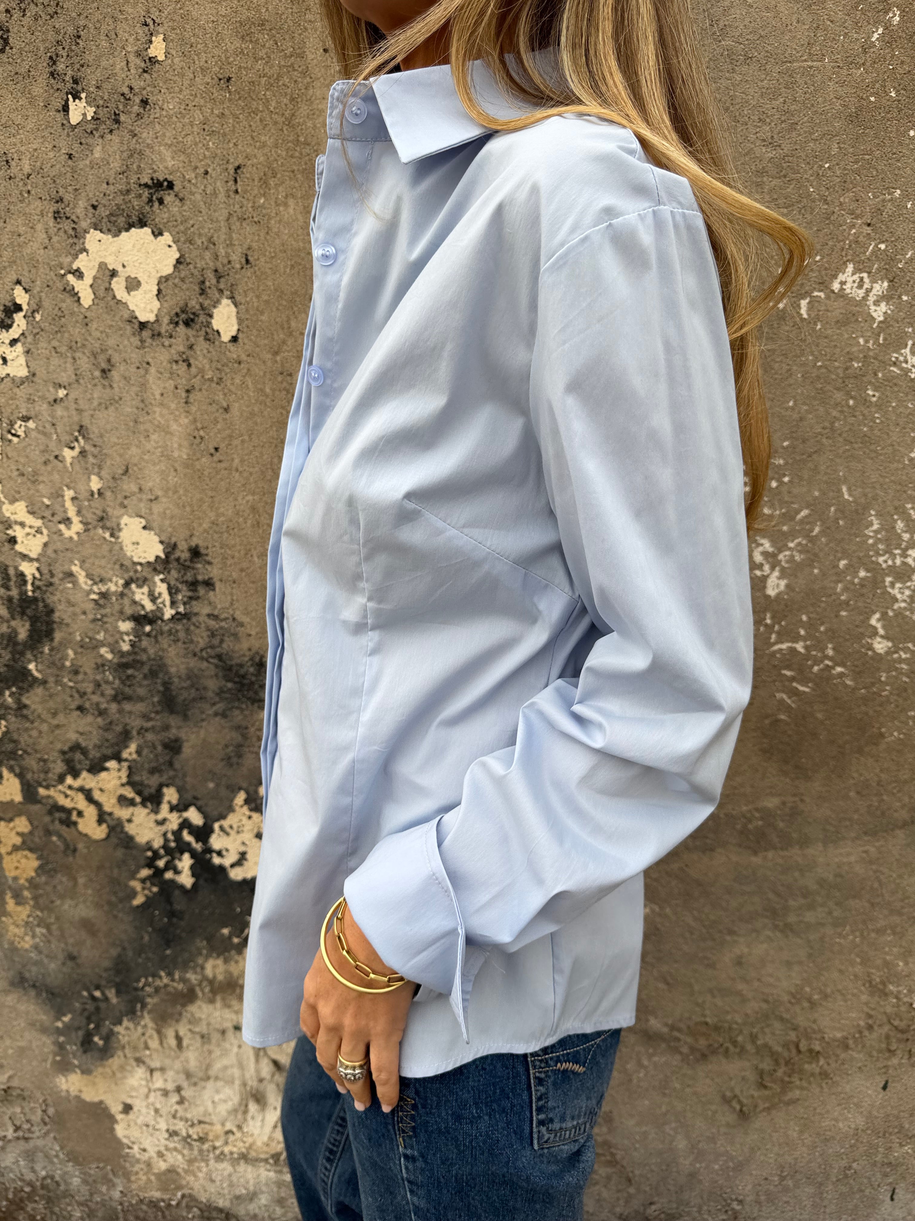 Blusa sastre botones escondidos celeste