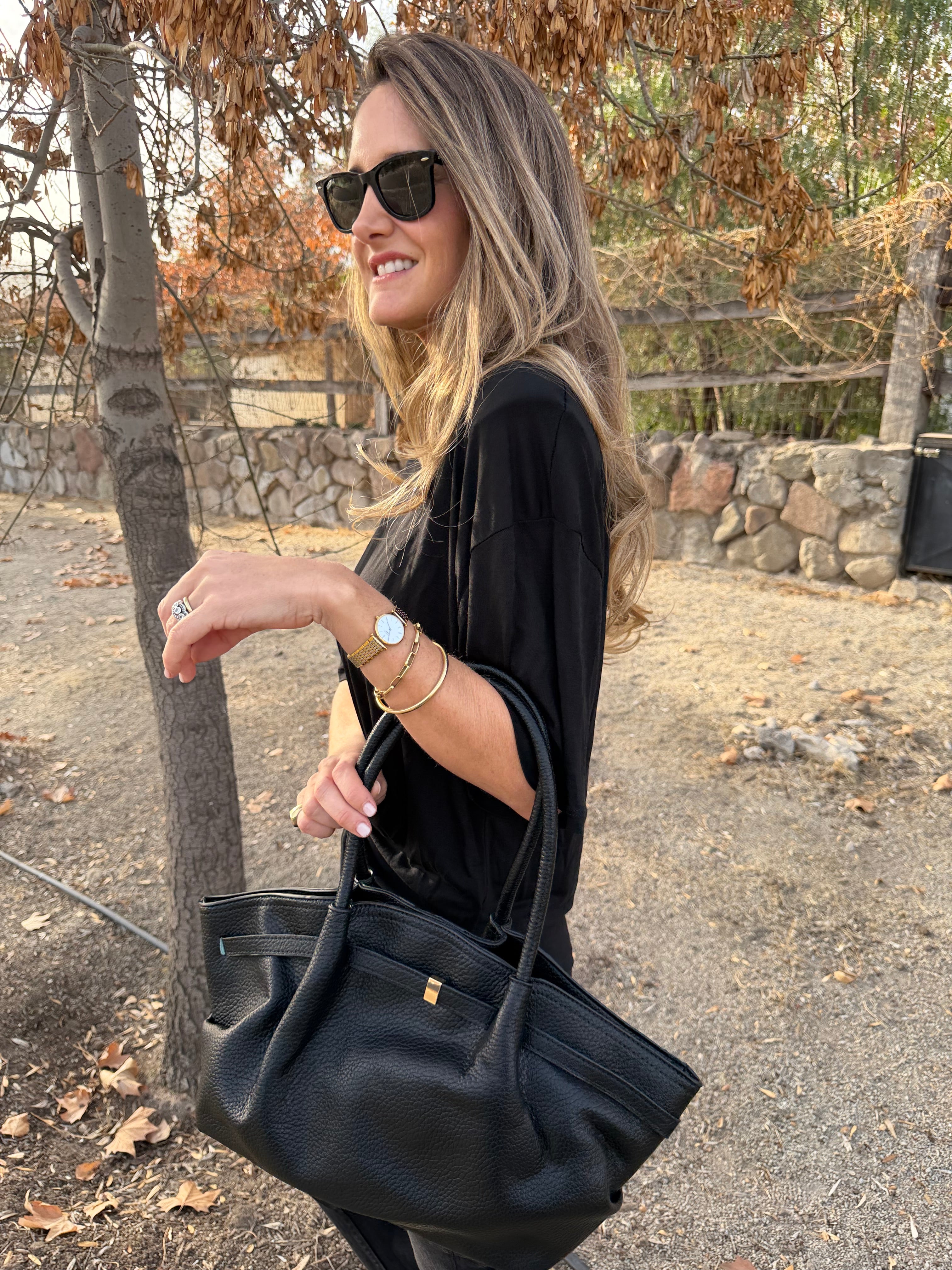 Cartera efecto cuero graneado maca negra
