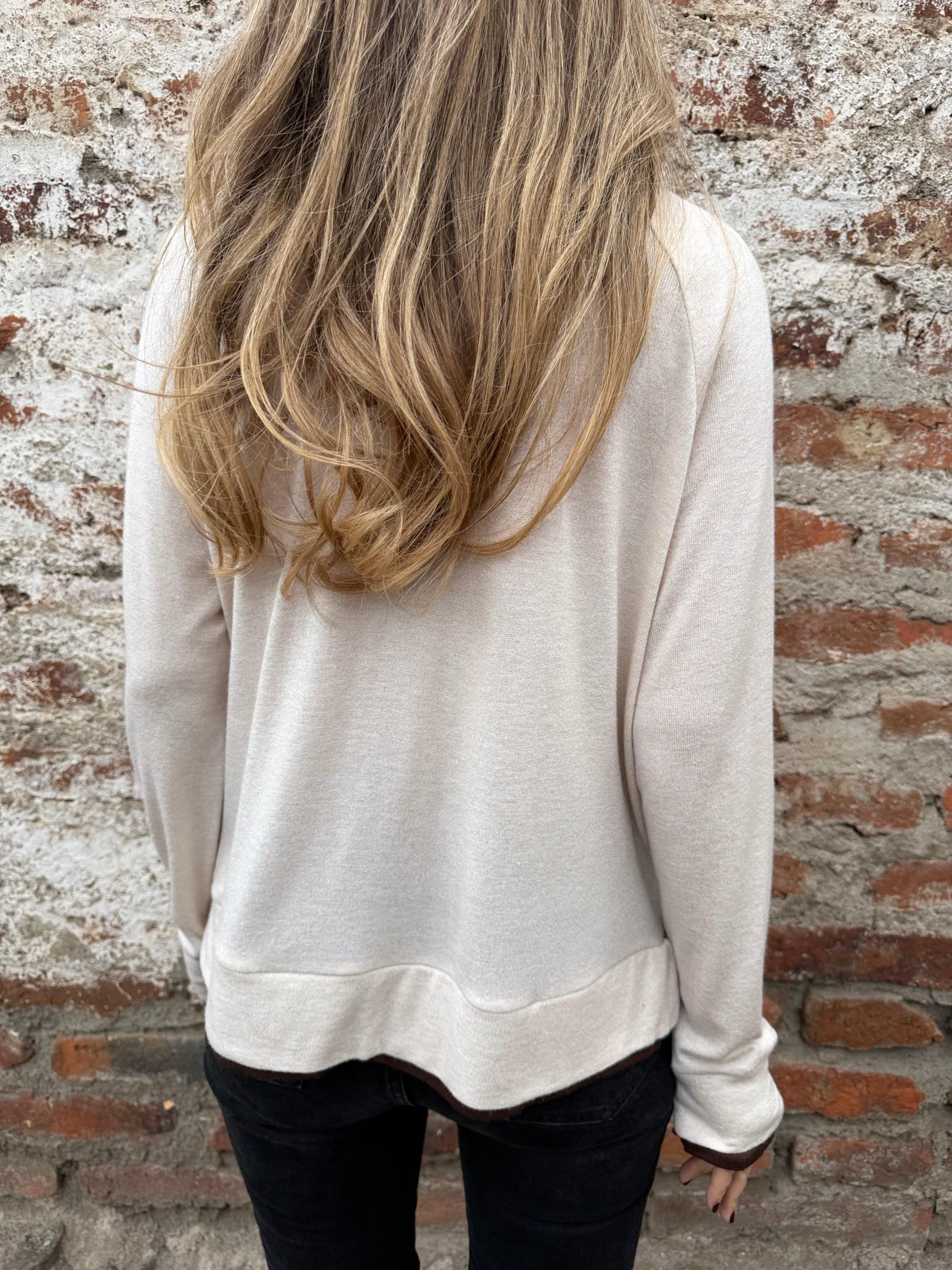 Polera lanilla doblez crudo
