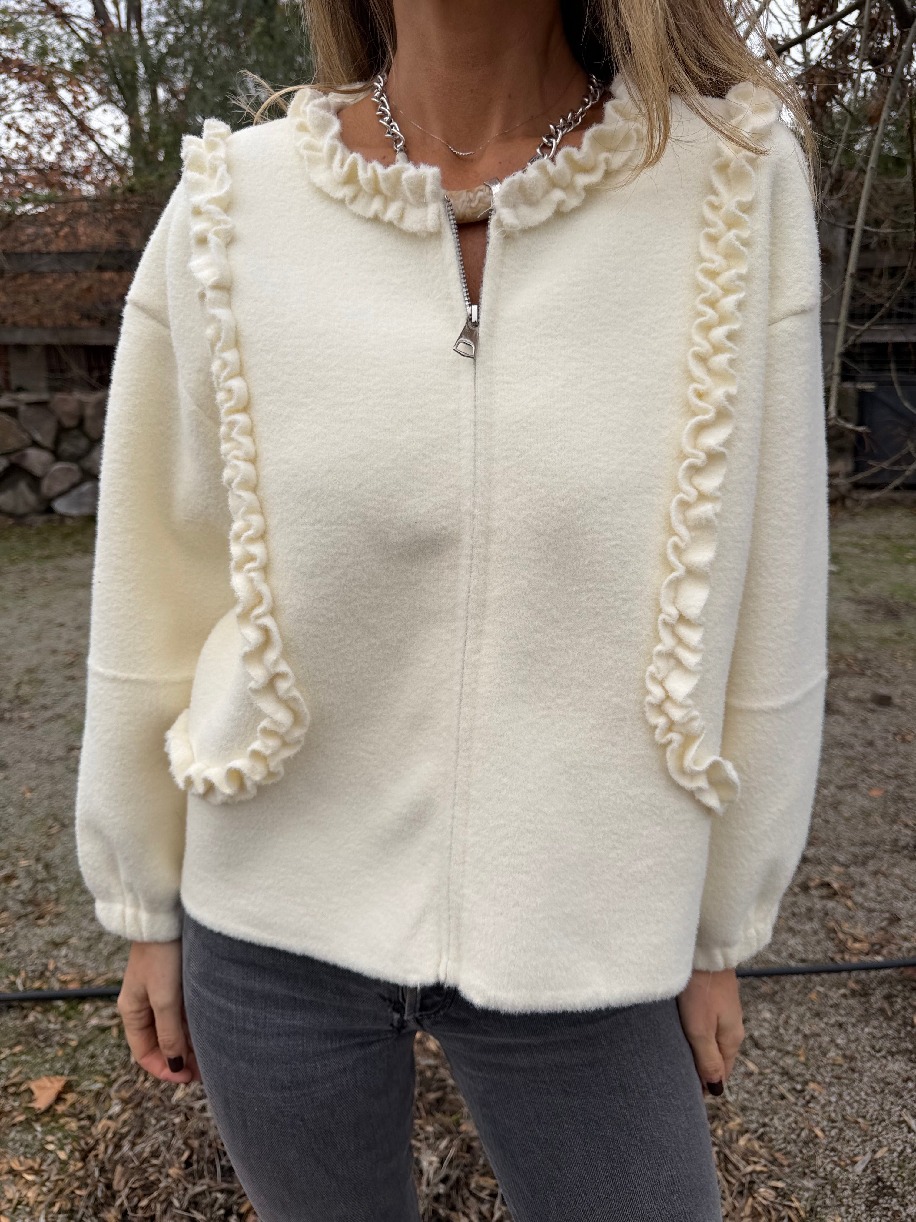 Chaquetita paño vuelitos blanca