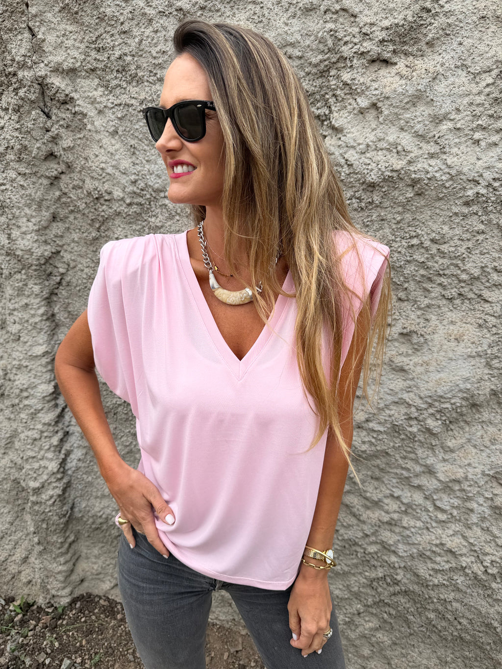 Polera hombreras plisadas rosada