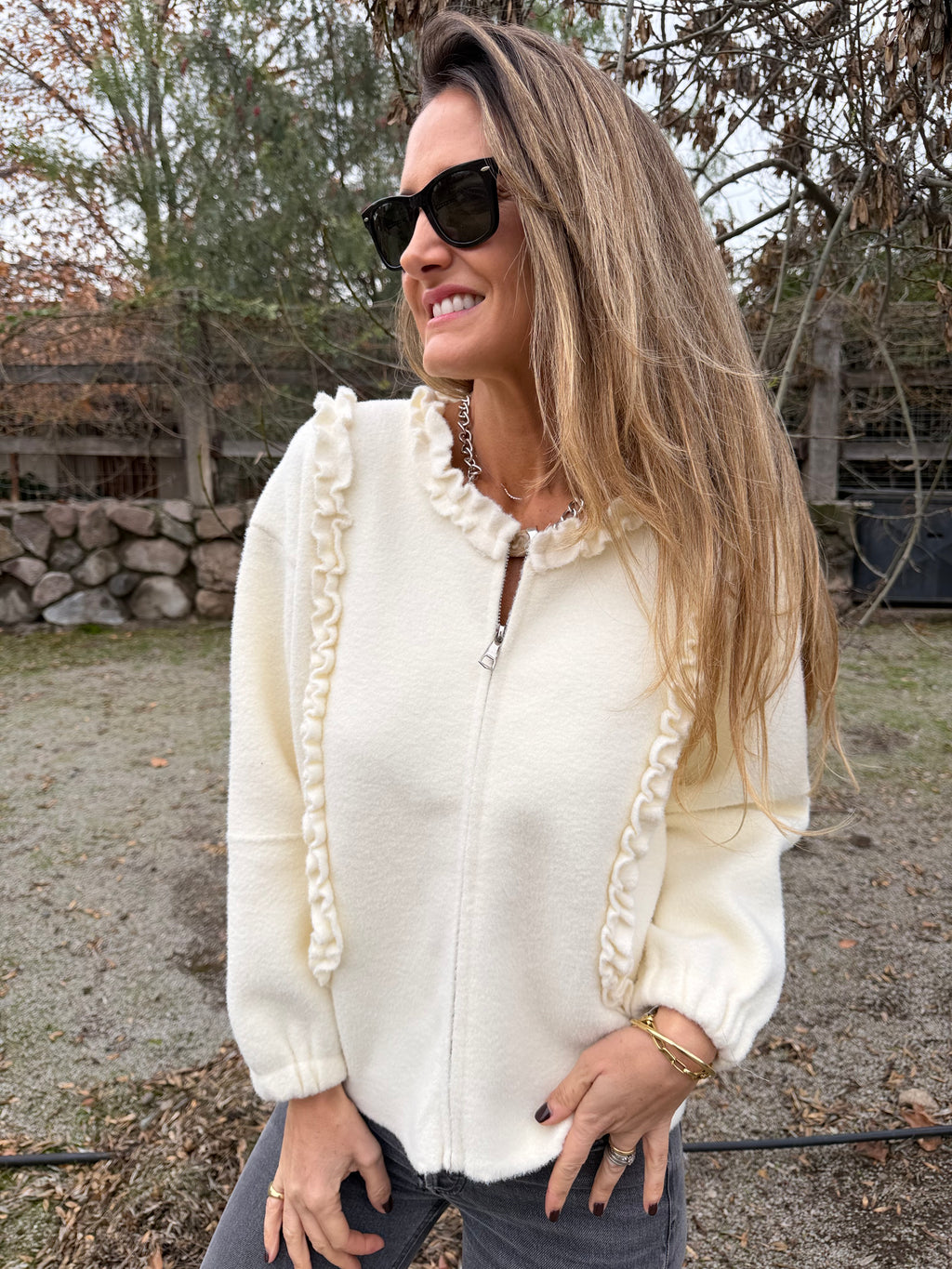 Chaquetita paño vuelitos blanca
