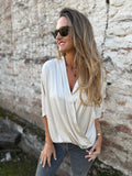 Blusa raso pliegues mantequilla