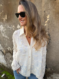 Blusa flores y bordados crudo