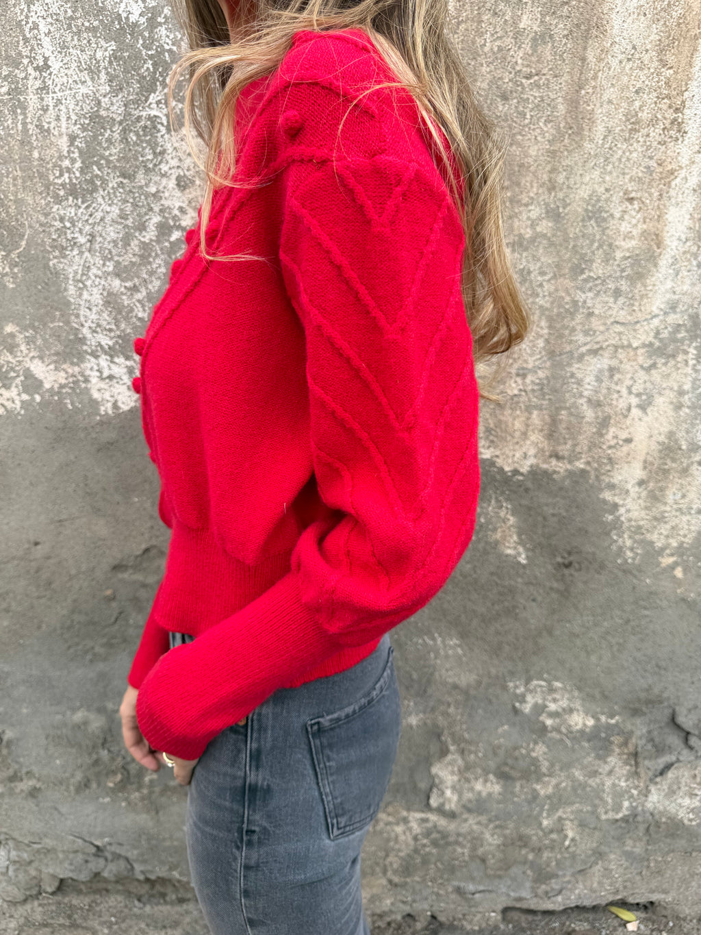 Chaleco mini pompón rojo