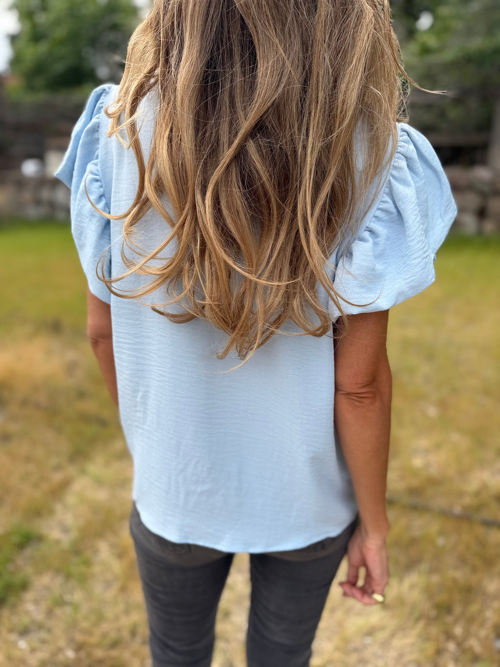 Blusa crep vuelitos mangas celeste
