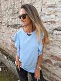 Blusa larga vuelitos laterales celeste