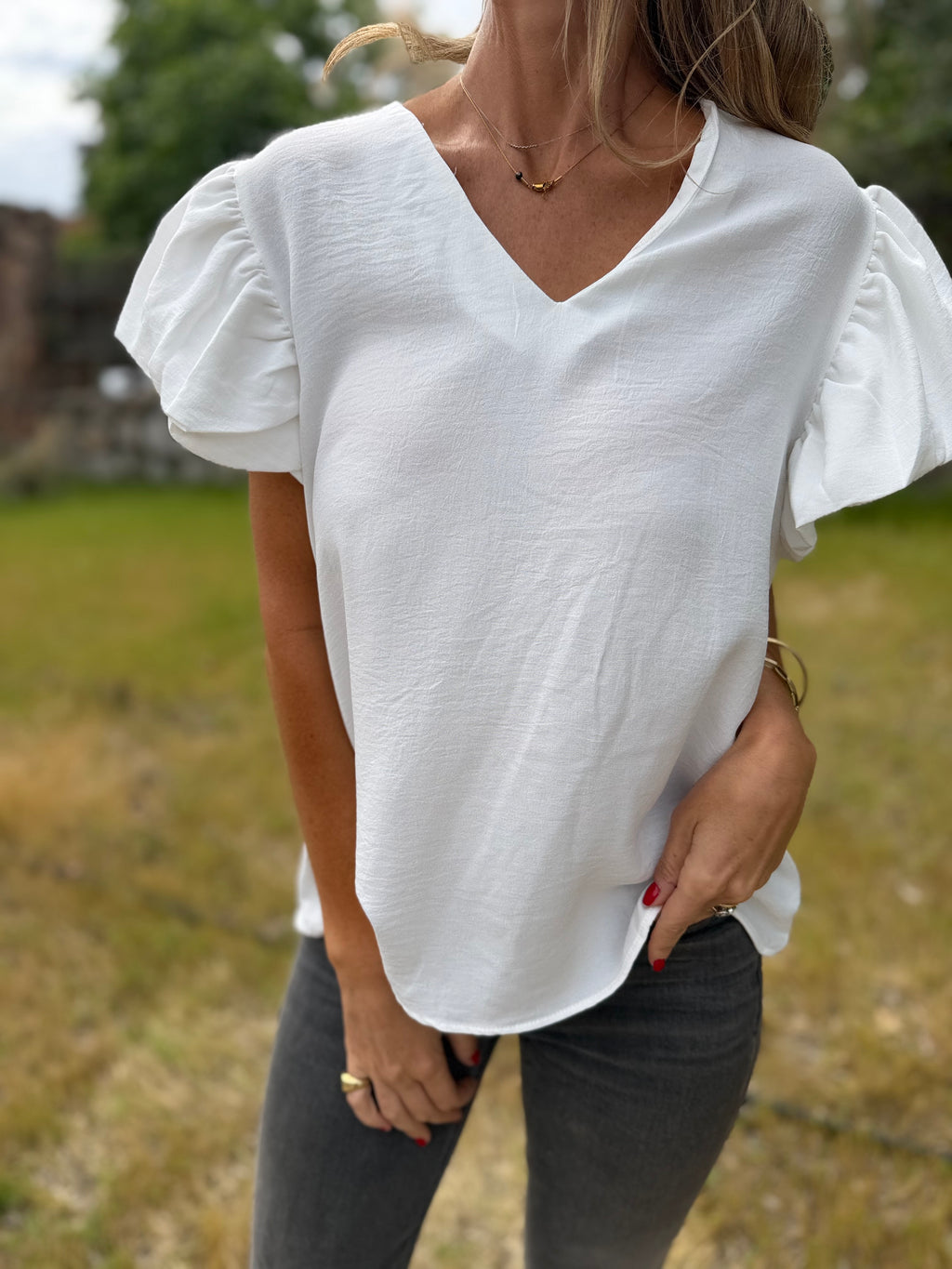 Blusa crep vuelitos mangas blanca