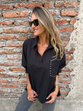 Blusa bolsillo brillantes negro