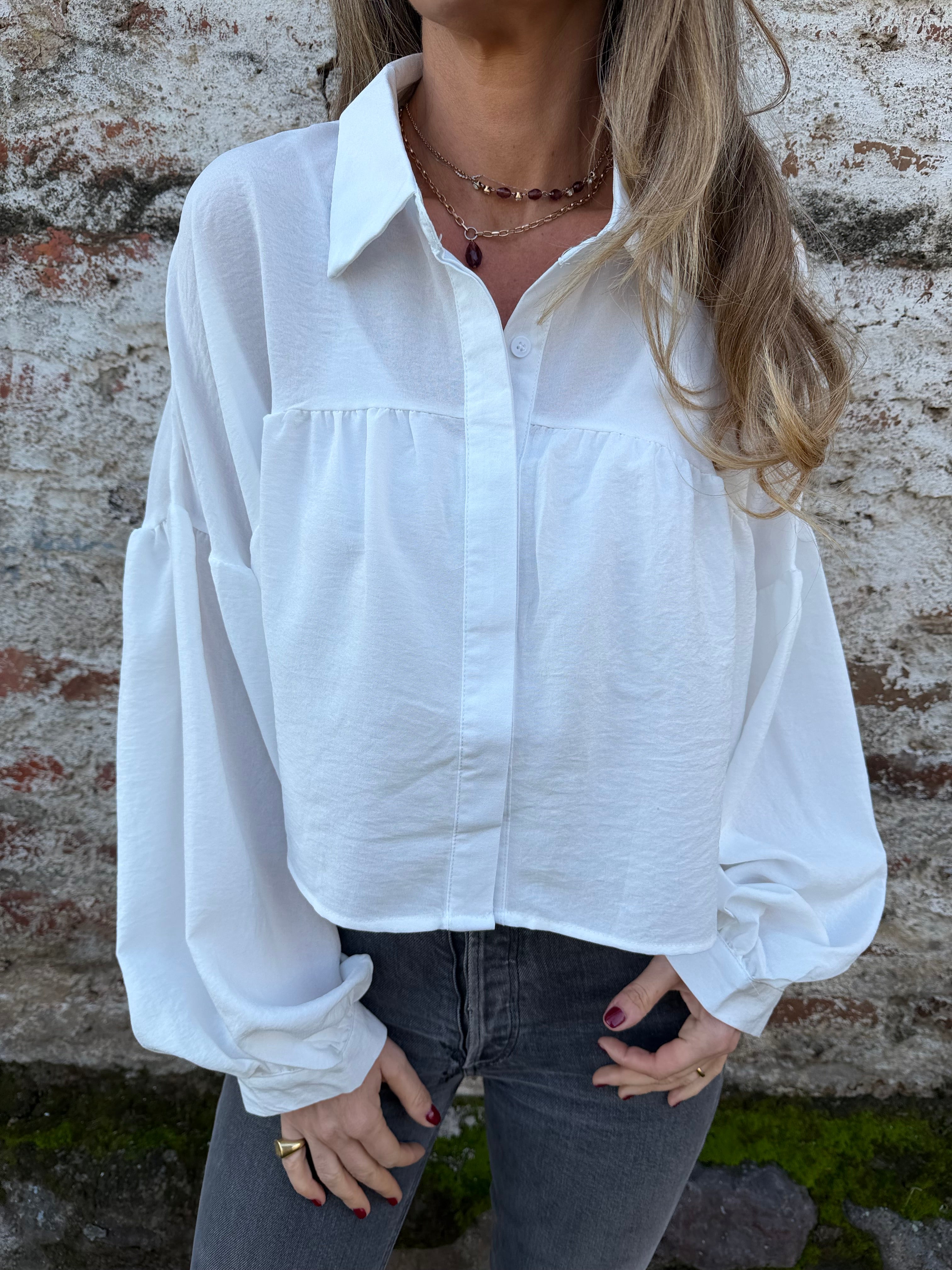 Blusa capas y manga globo blanca