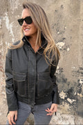 Chaqueta efecto cuero desgastado negra
