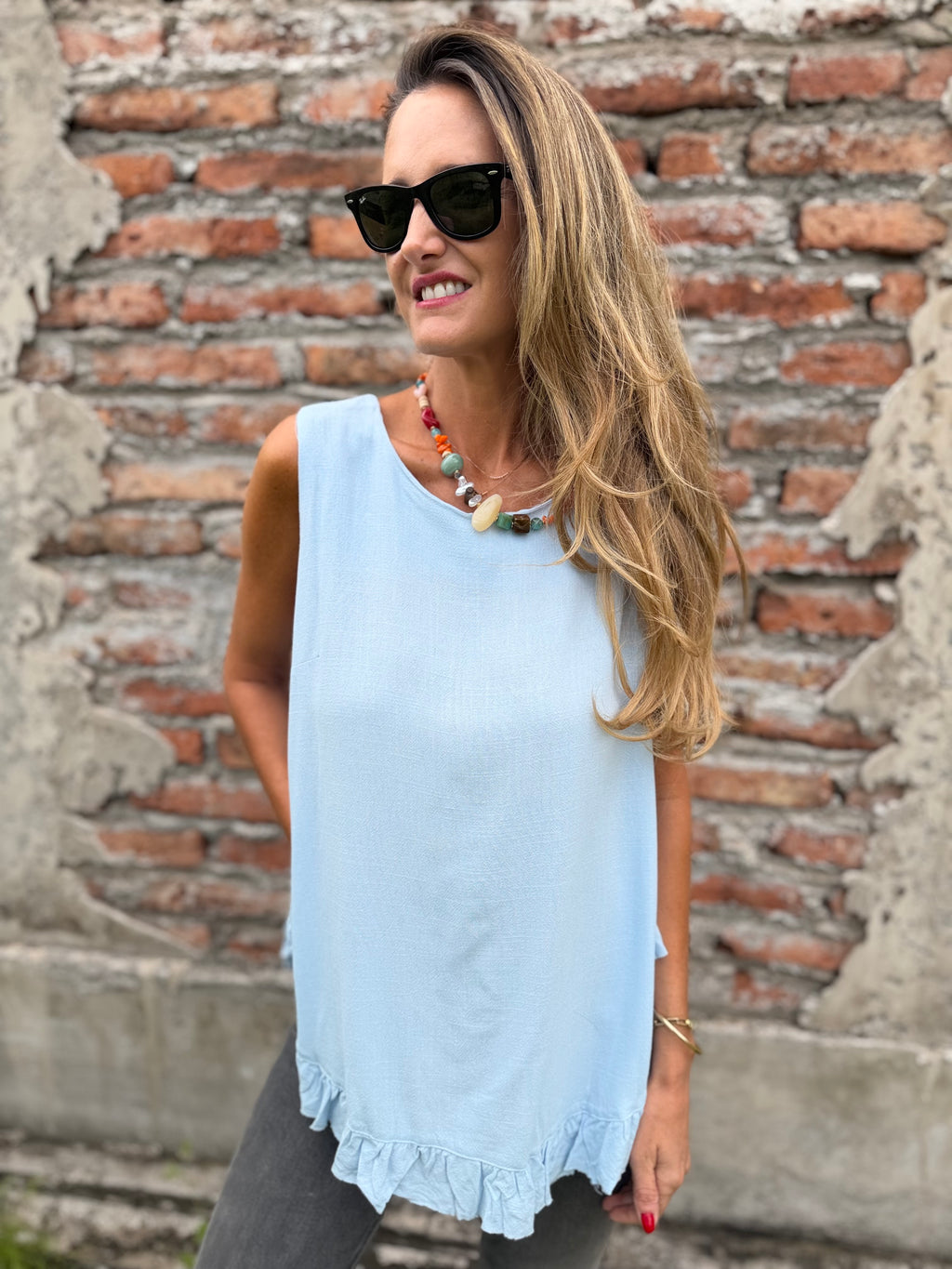 Blusa espalda abierta vuelitos celeste