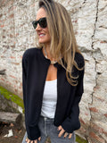 Chaquetita tejida vuelitos negra