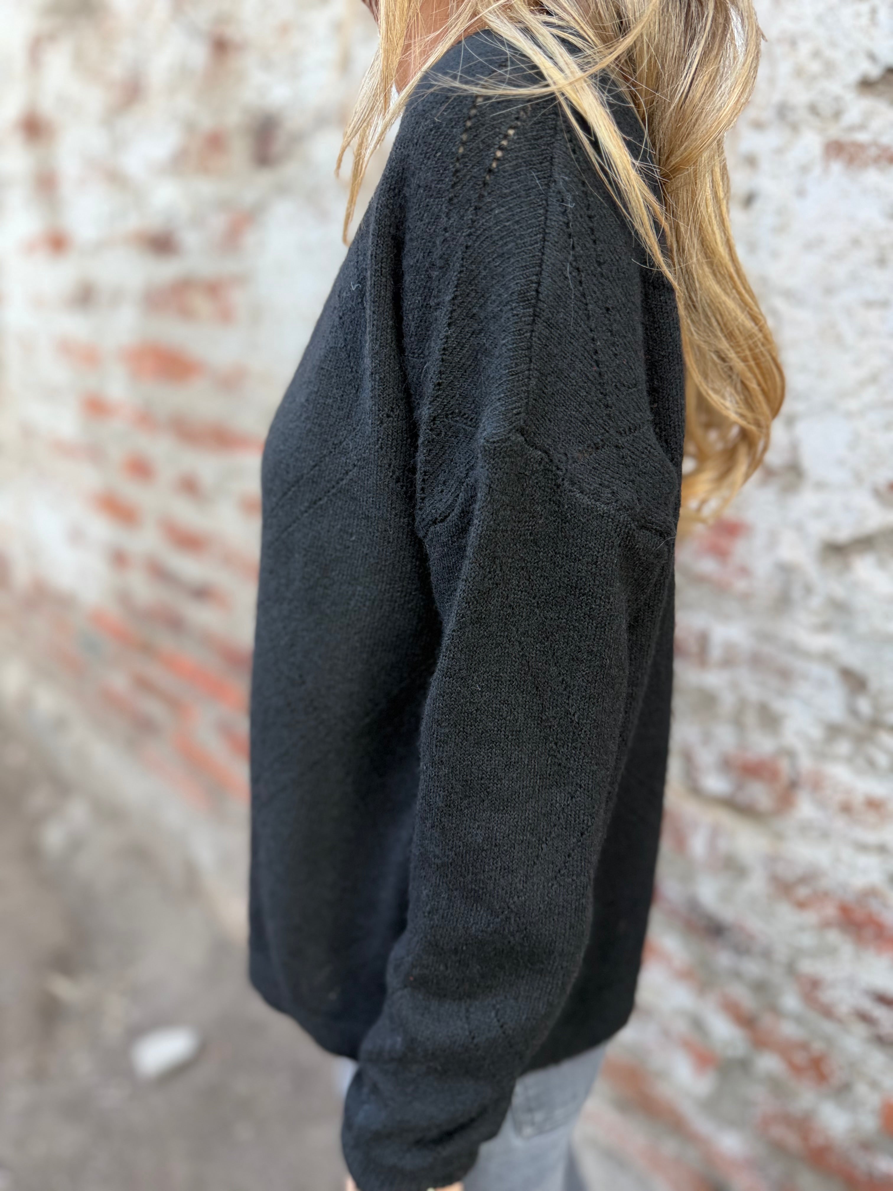 Chaleco básico cuello V diseños negro
