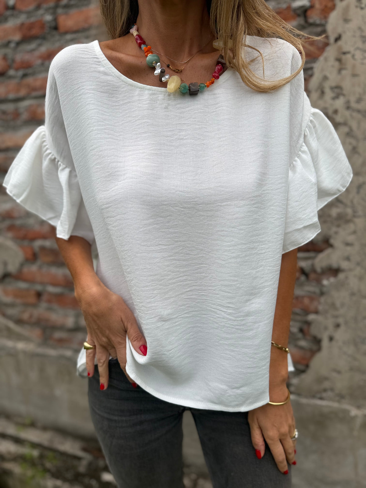 Blusa cuello subido volados blanca
