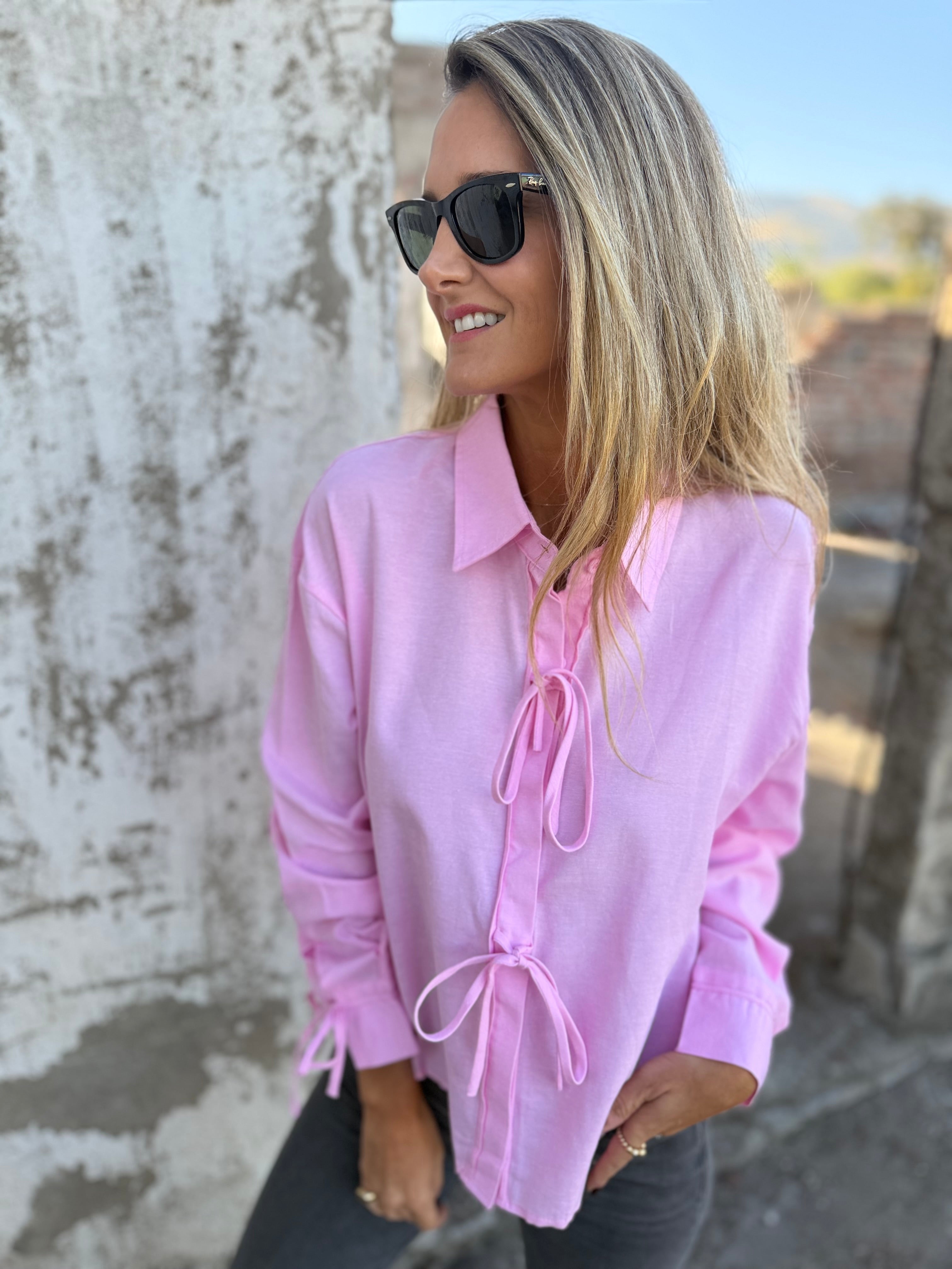 Blusa amarritas y botones escondidos rosada