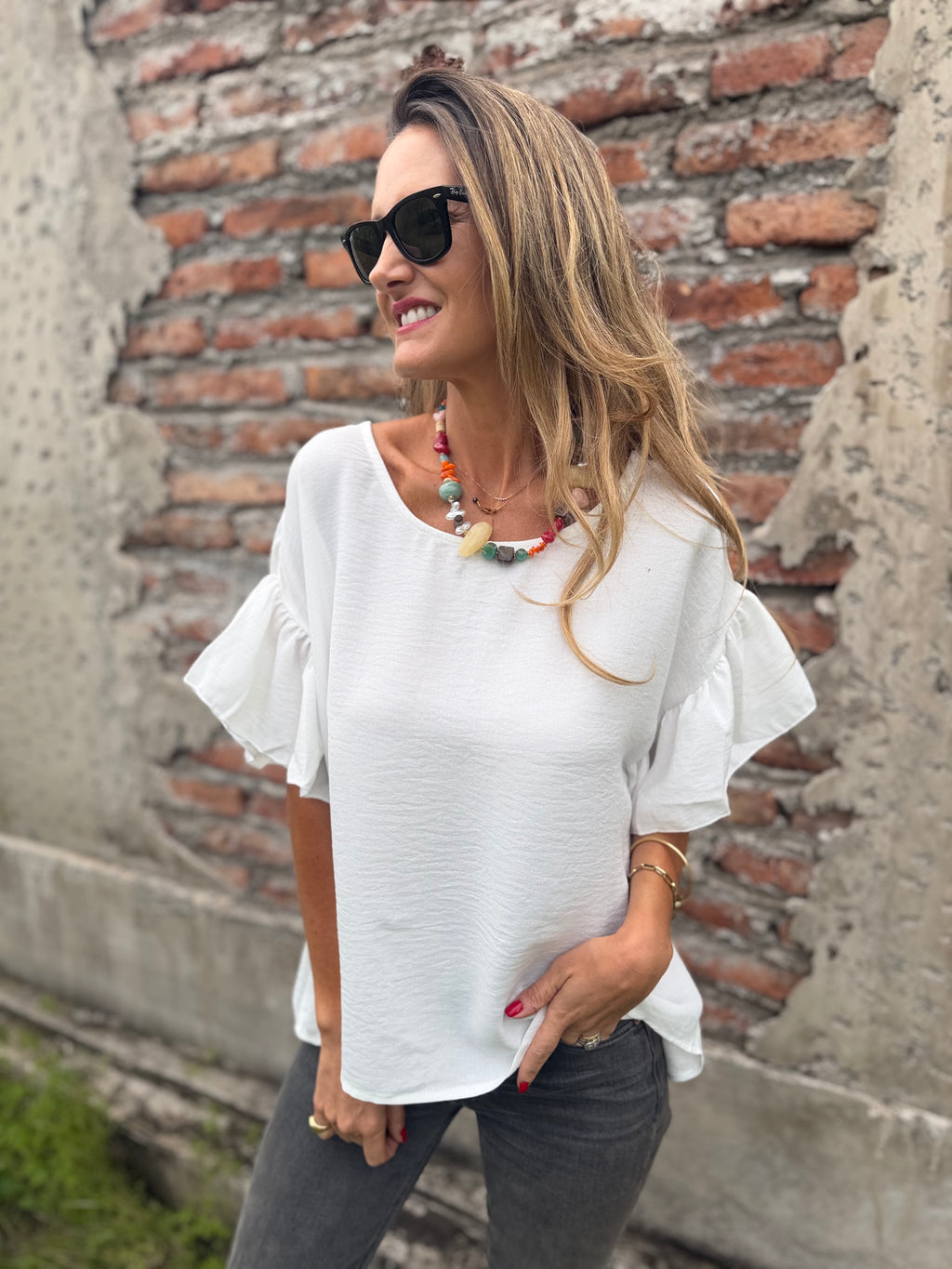 Blusa cuello subido volados blanca