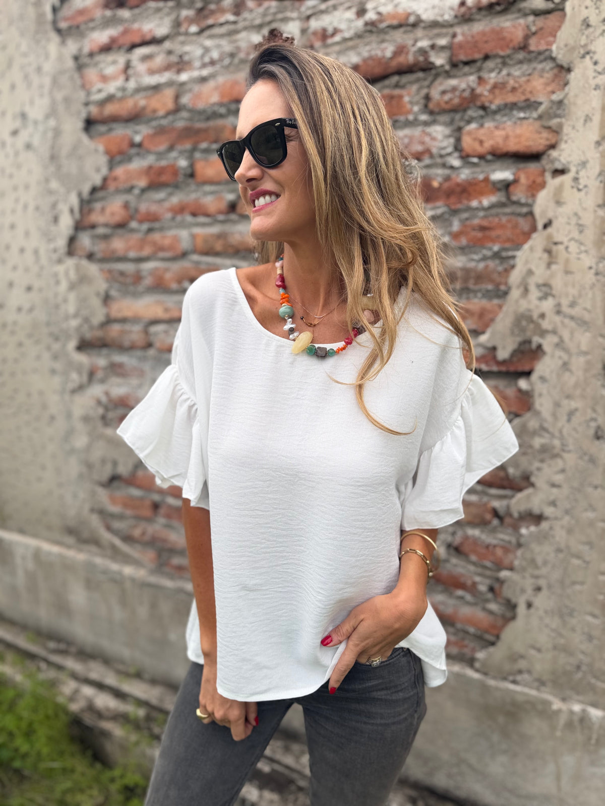 Blusa cuello subido volados blanca