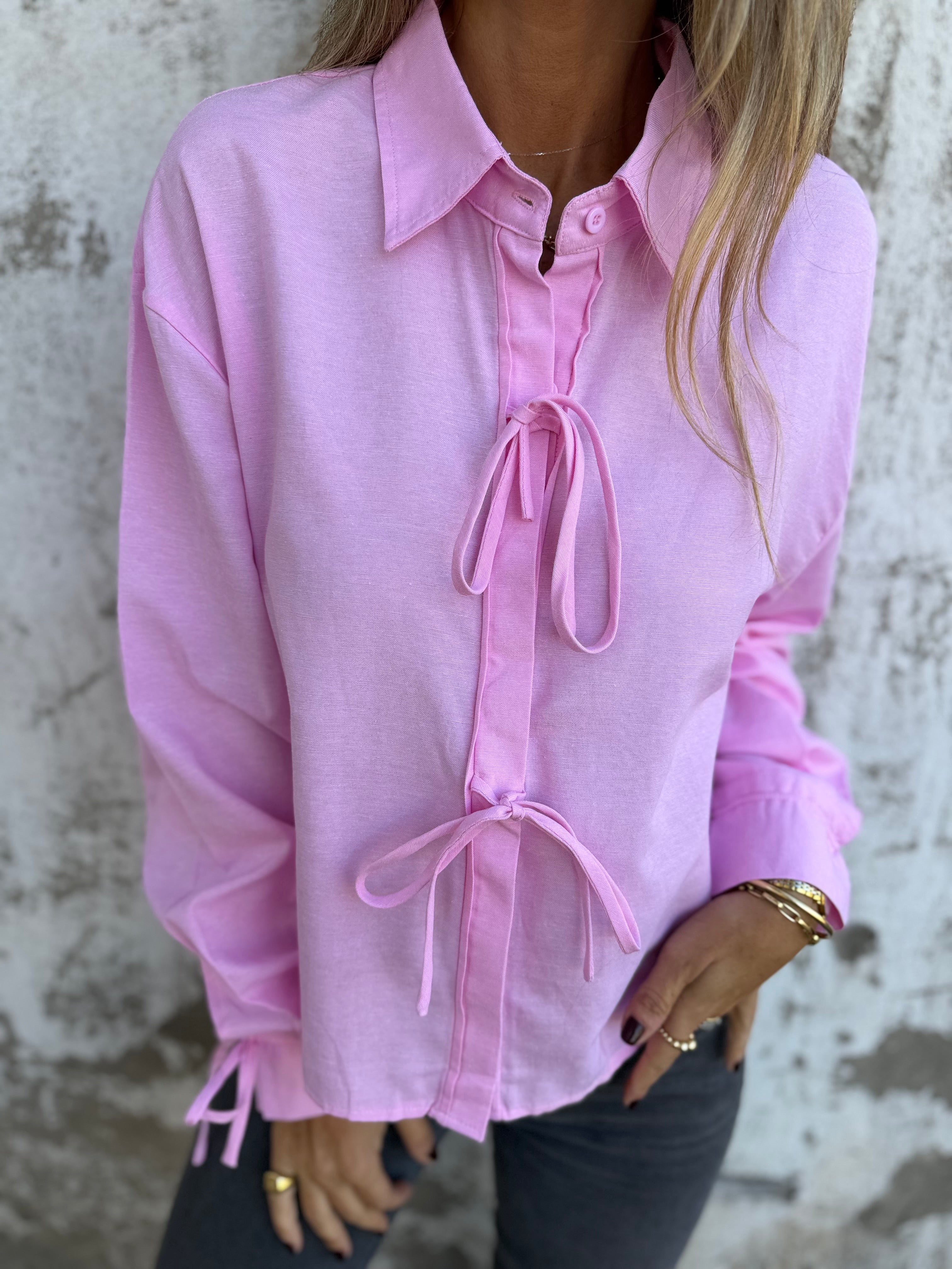 Blusa amarritas y botones escondidos rosada