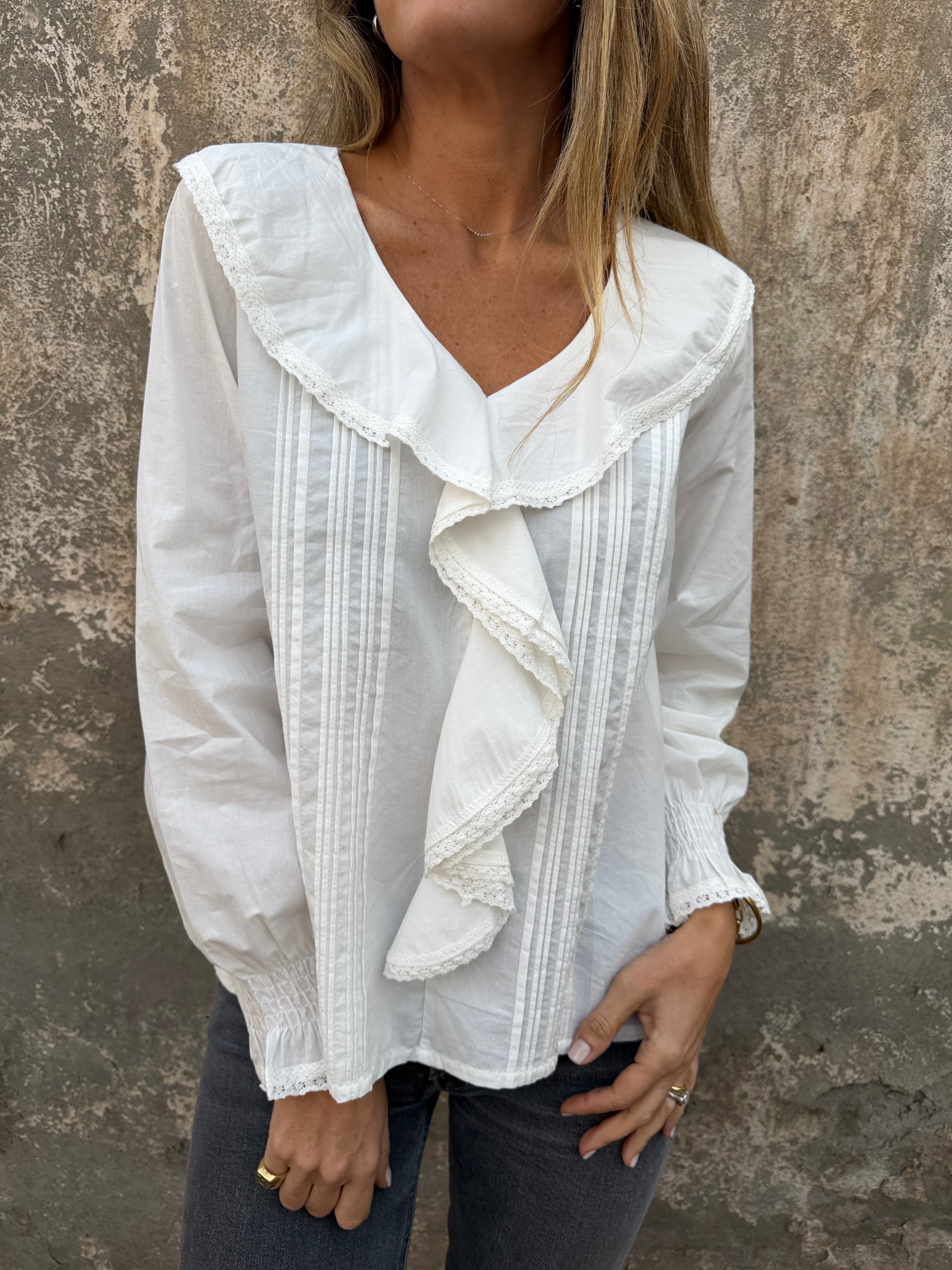 Blusa volados centrales blanca
