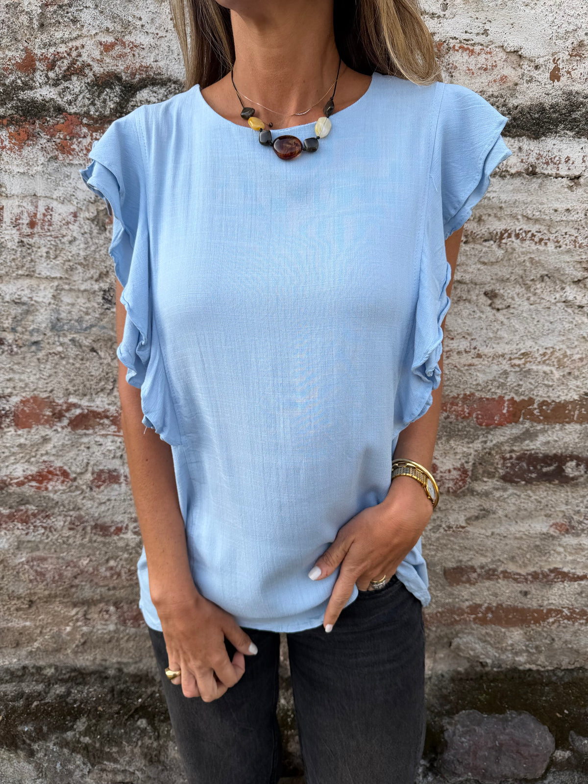 Blusa larga vuelitos laterales celeste