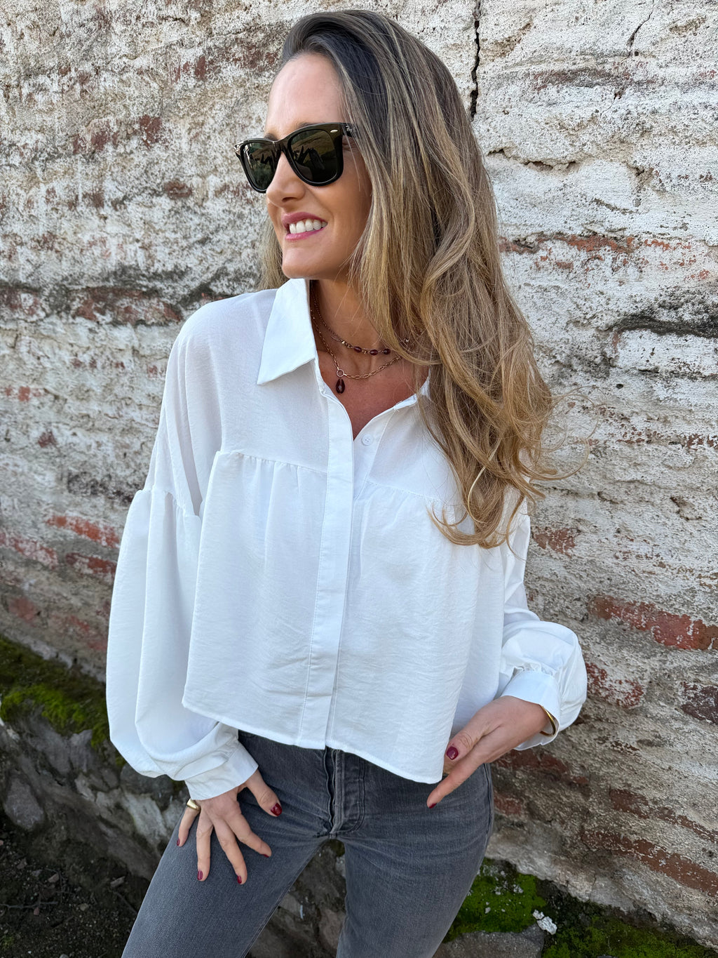 Blusa capas y manga globo blanca