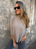 Chaleco medio cuello tachas beige