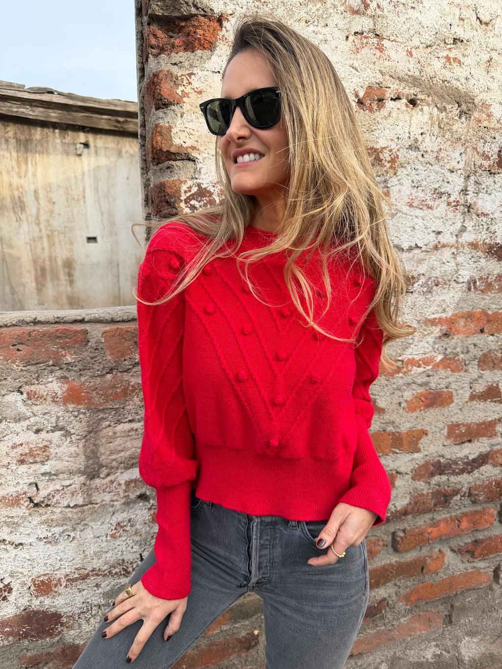 Chaleco mini pompón rojo