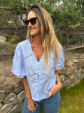 New blusa mangas abullonadas celeste