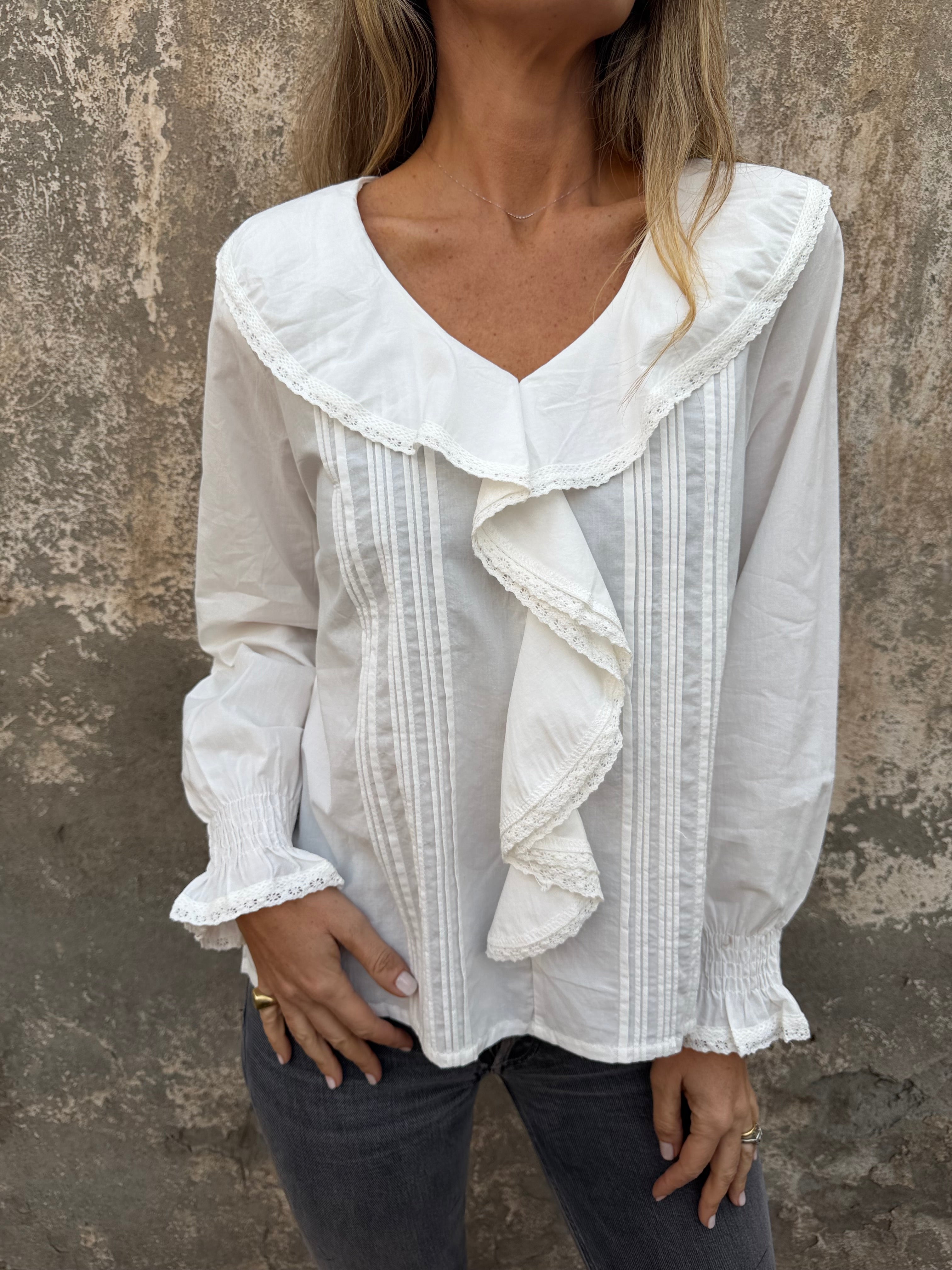 Blusa volados centrales blanca