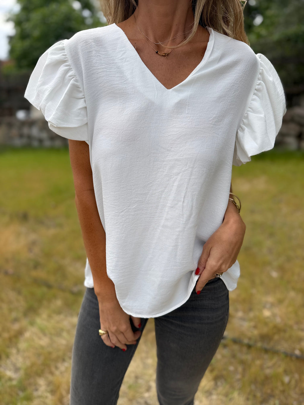 Blusa crep vuelitos mangas blanca