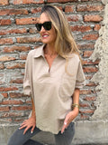 Blusa bolsillo brillantes beige claro